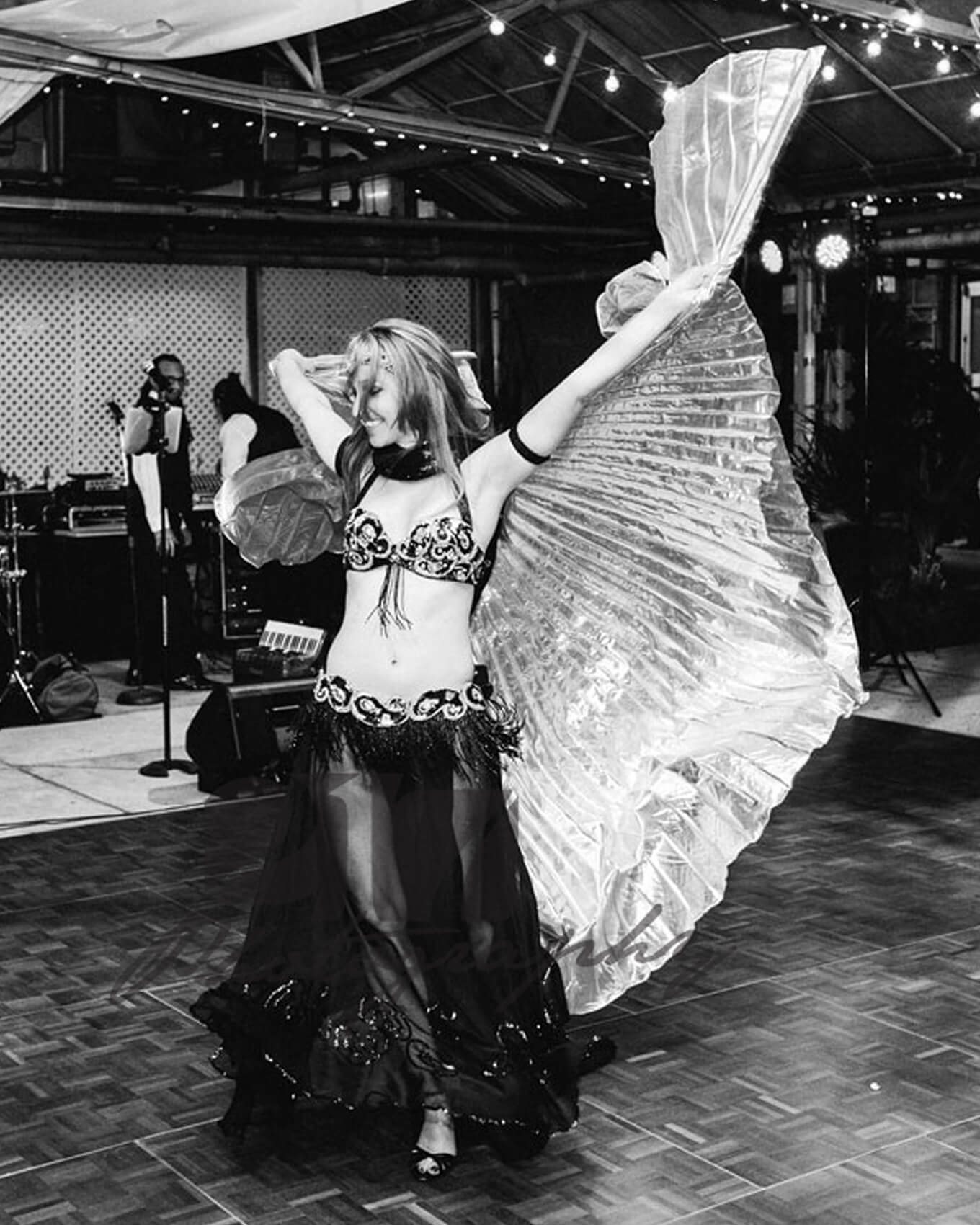 Donna using isis wings at an event
